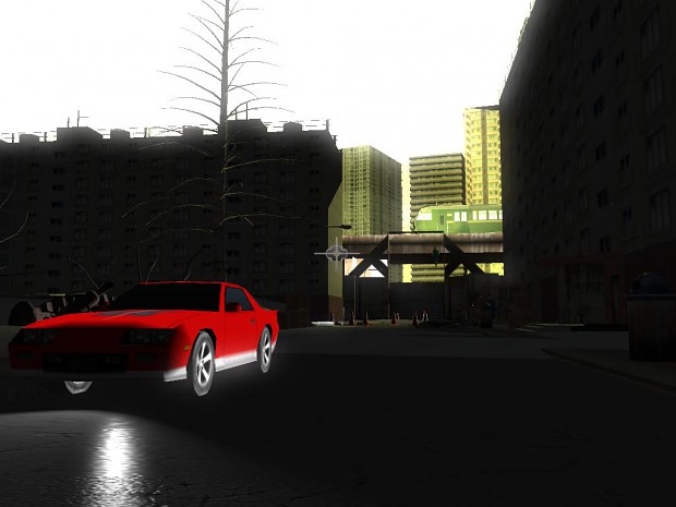 Red car, buildings, train