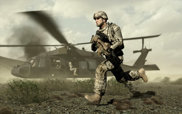 Soldier with helicopter behind