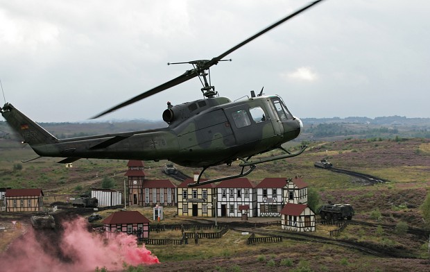 Bell UH-1D (Medevac) overflies the battlefield