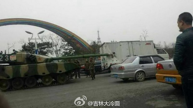 PLA Type 96 accidentally "poked" a JMC van in China.
