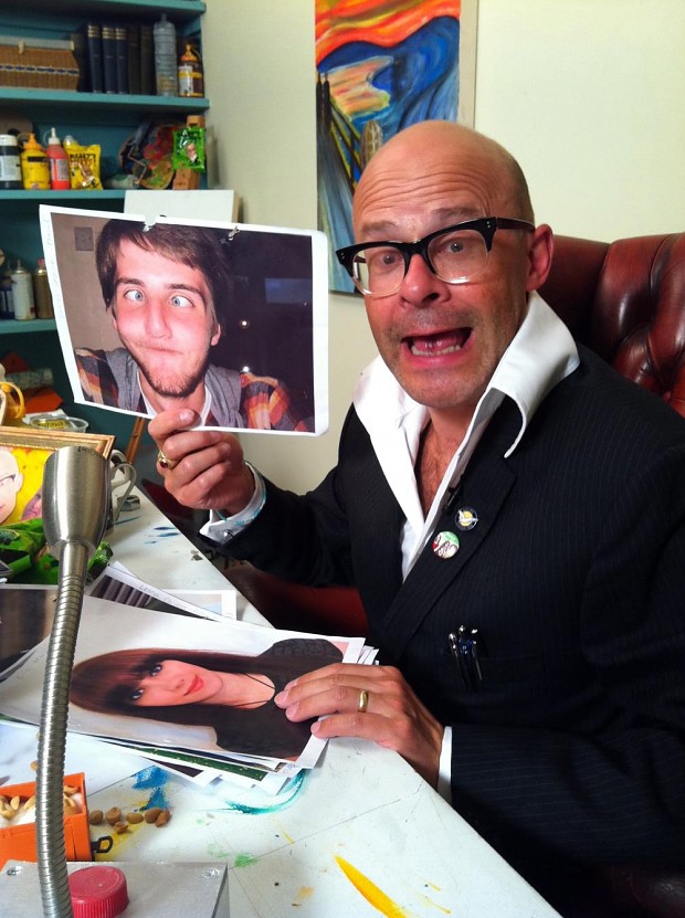 Harry Hill holding a picture of me