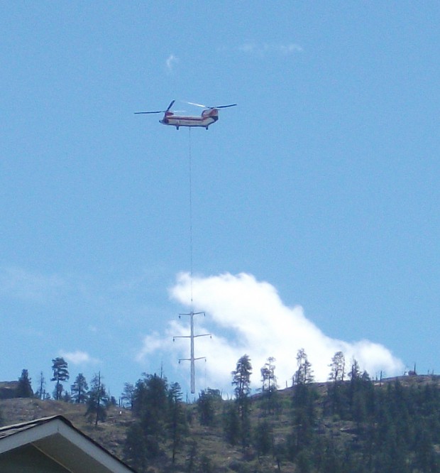 Chinook putting up telephone poles 