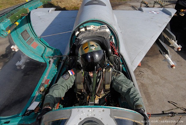 Pilot in MiG-21 enjoys in his cocpit