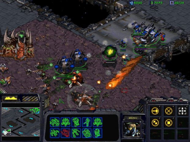 Zerg Base under attack from a Terran force