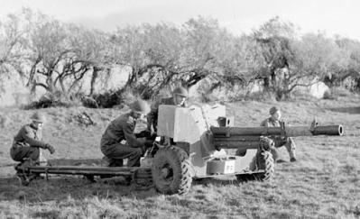 A QF 6 Pounder Crew training in the UK prior to Operation Overlord