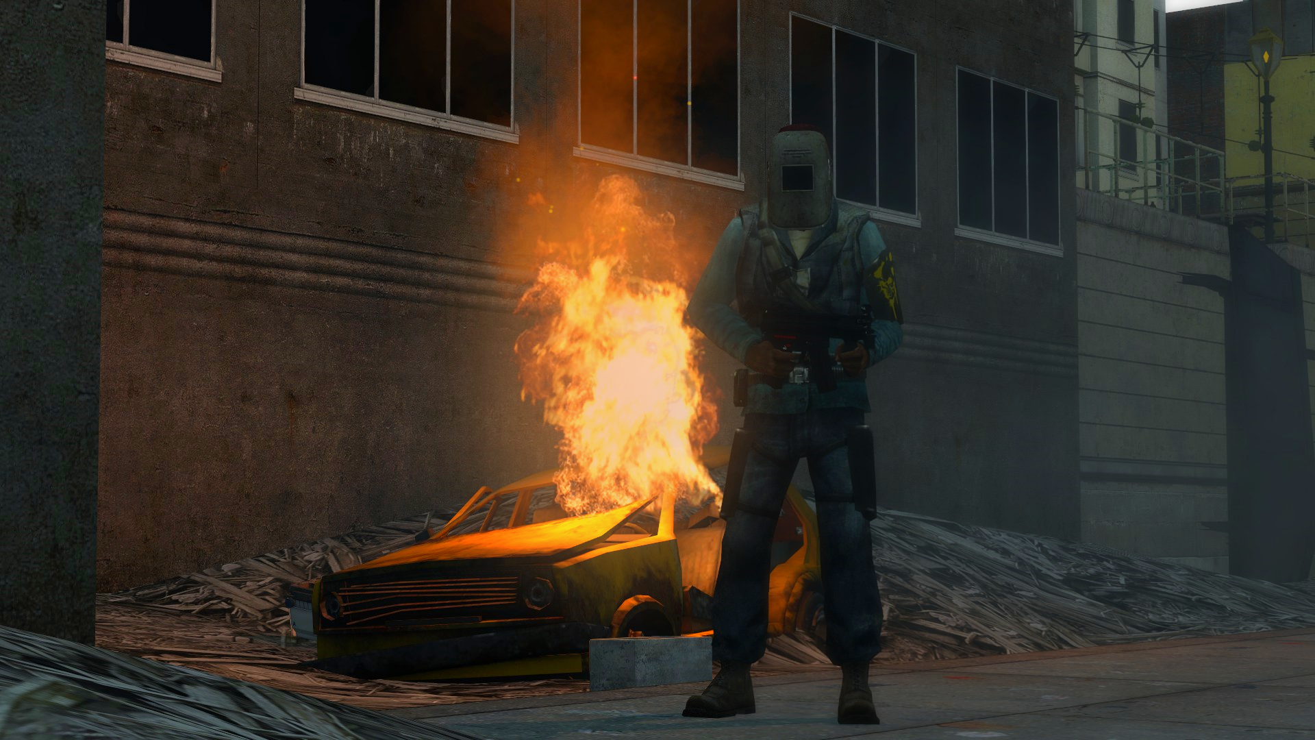 Rebel Brute in front of a burning car.